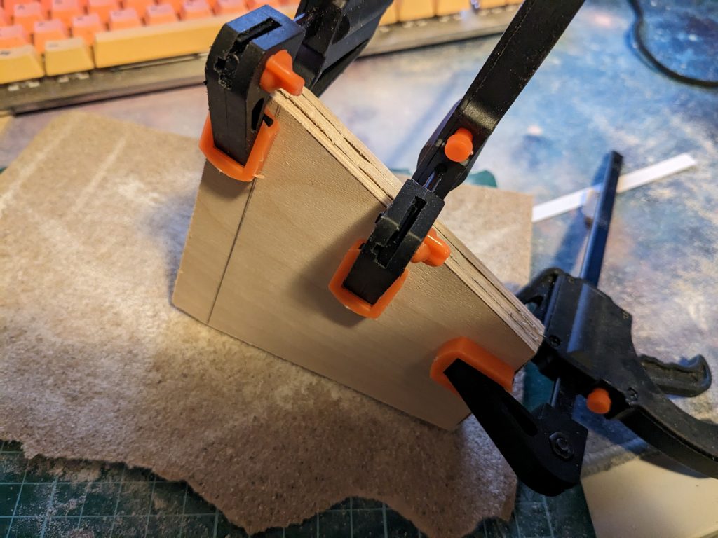 Fins clamped for sanding